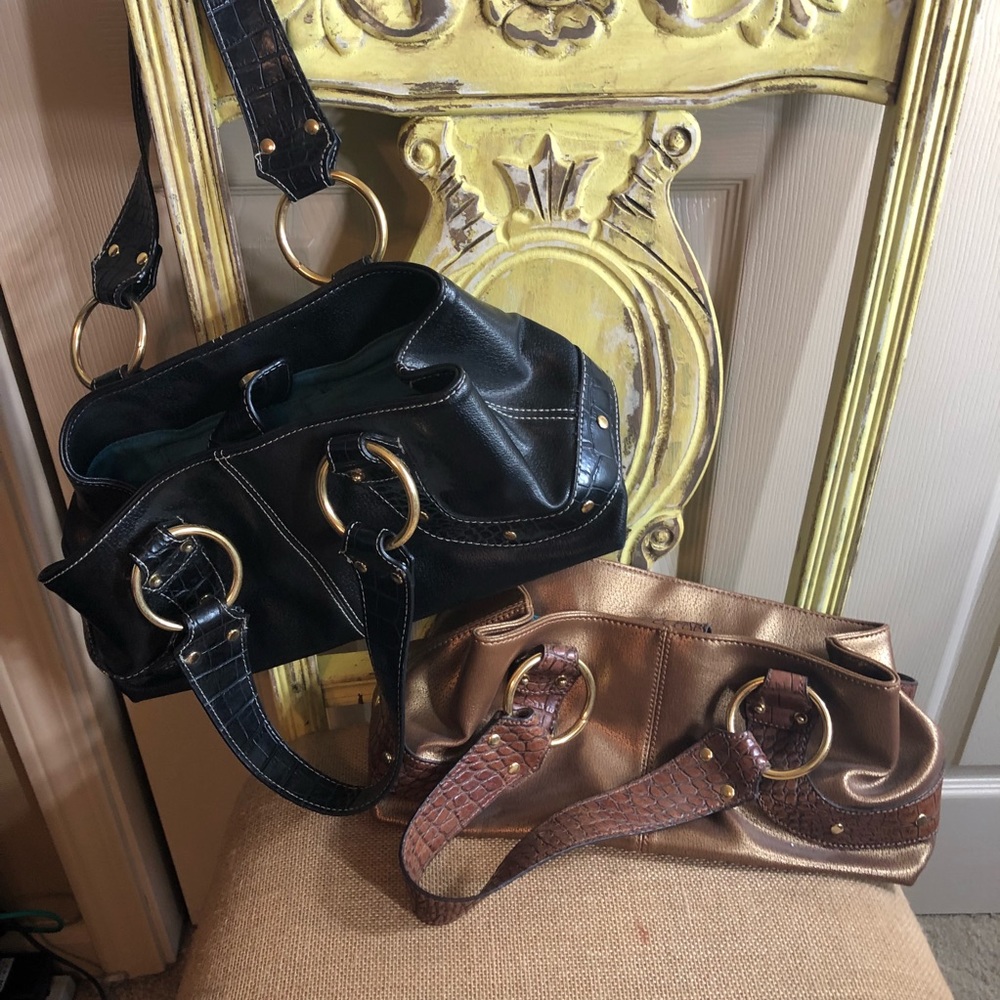 Twins bags- one black and gold, one brown and gold